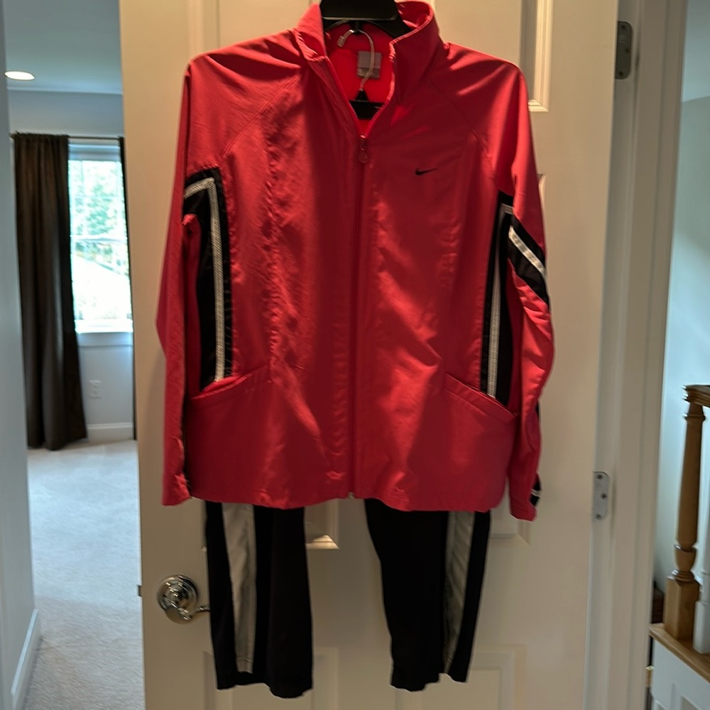 Nike track suit. Jacket and capri pants